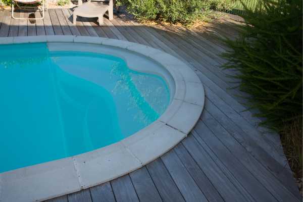 Detail shot of premium stone pool coping installed in Alamo, California